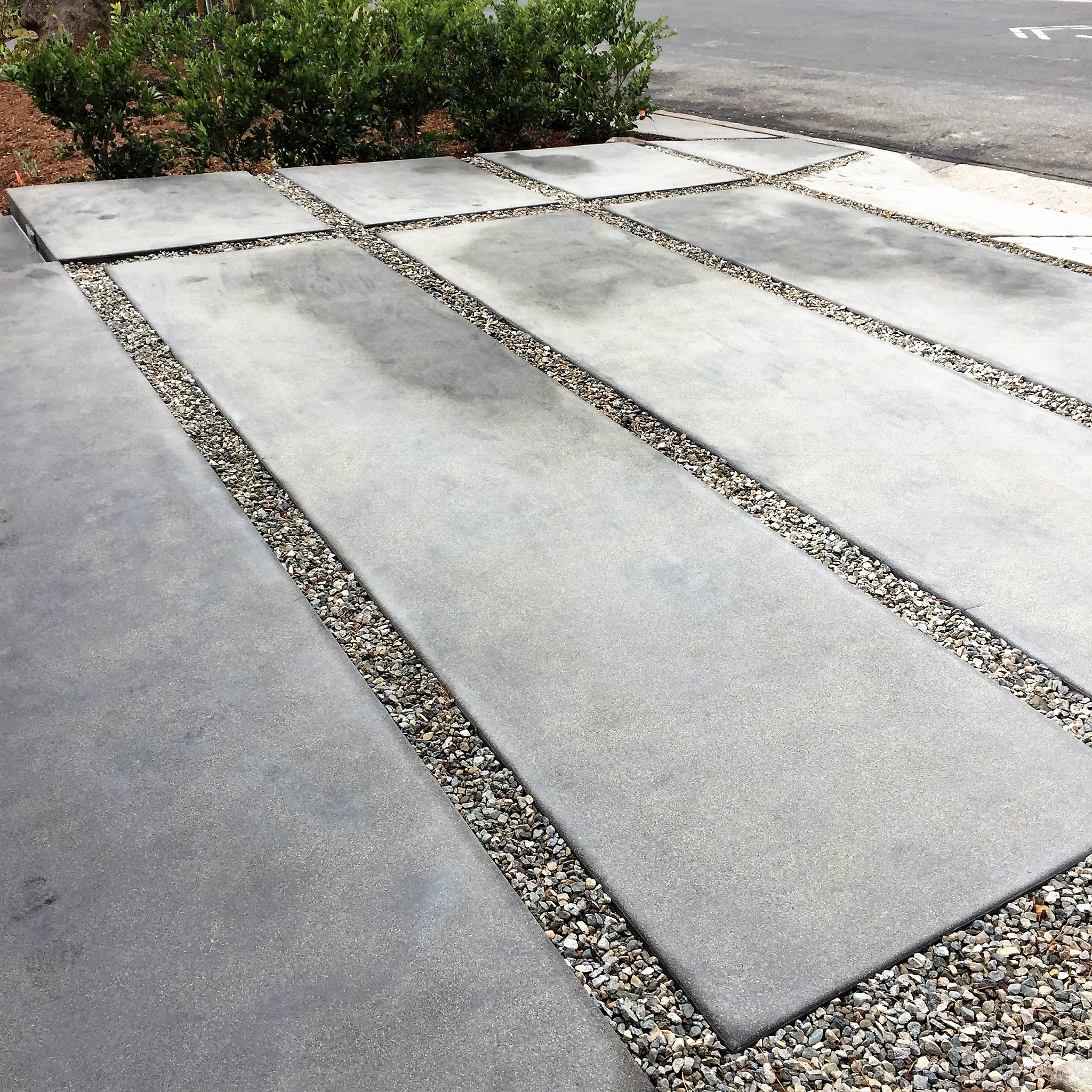 Ed's Landscaping Gray Concrete Slab Driveway Project