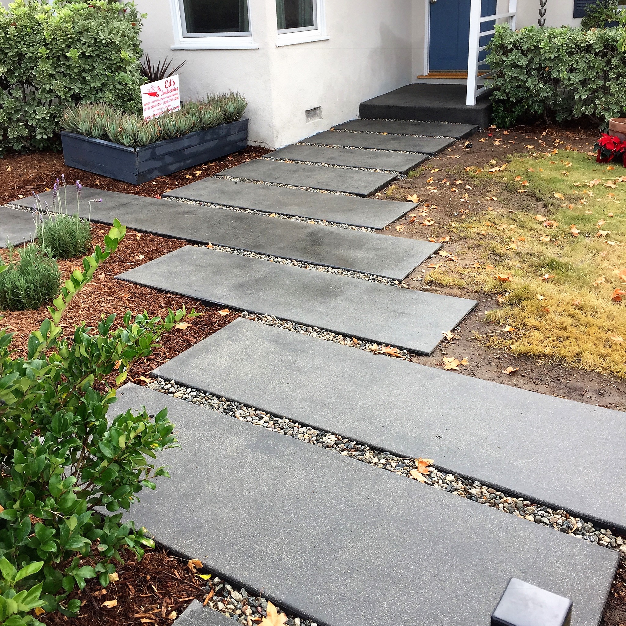 Ed's Landscaping Gray Slab concrete walkway