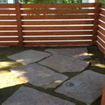 Ed's Landscaping horizontal fence with natural stone